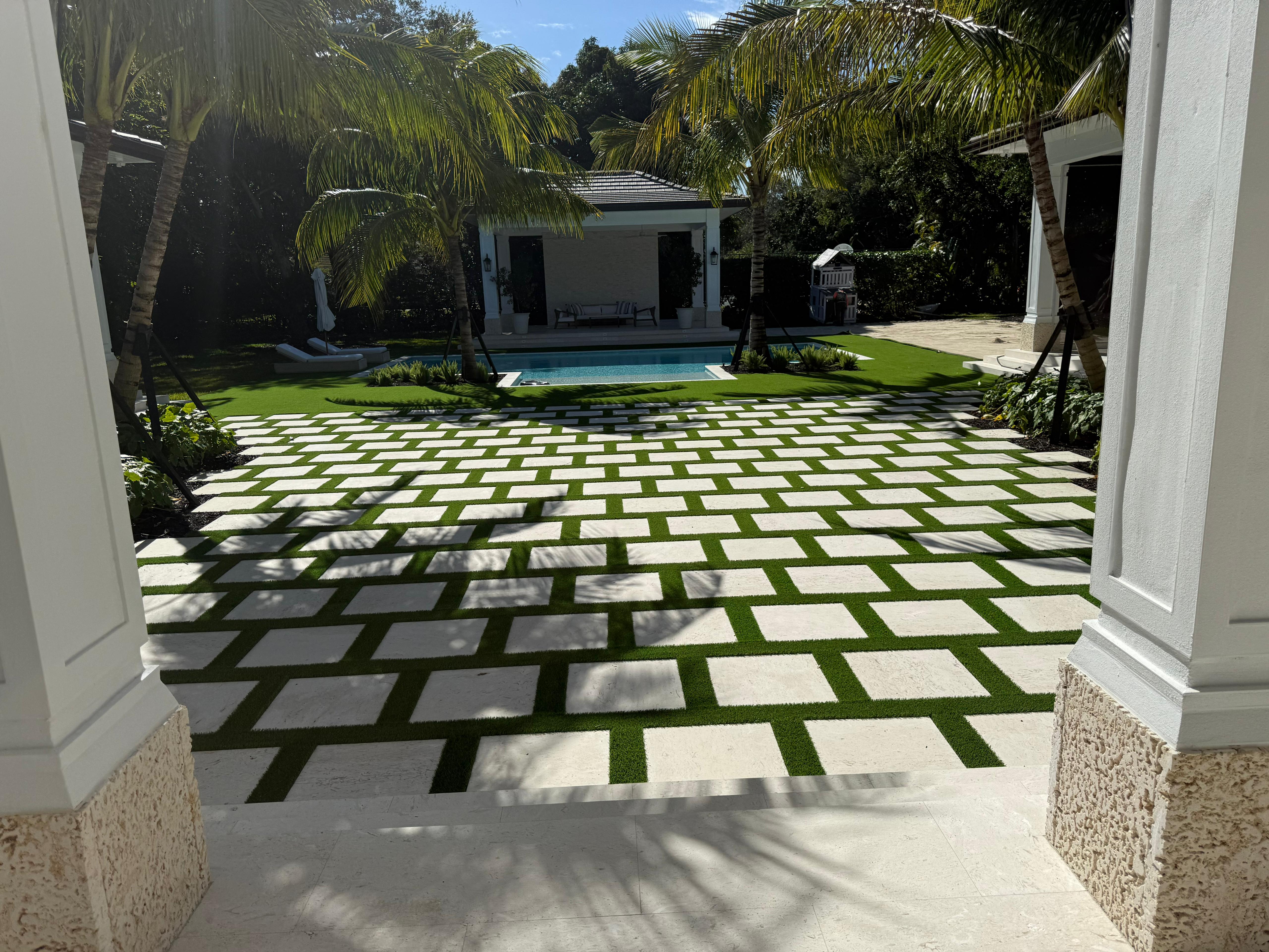 Paver driveway with artificial grass Boca Raton